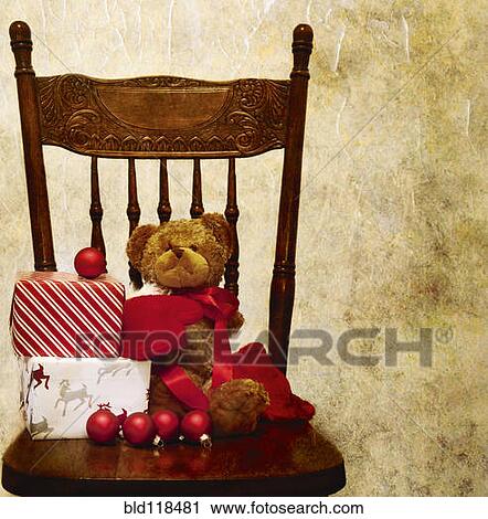 Wrapped presents, gifts, ribbon, ornaments, and a teddy bear soft toy View Large Photo Image Stock Image - Wrapped presents, gifts, ribbon, ornaments, and a teddy bear soft toy. Fotosearch