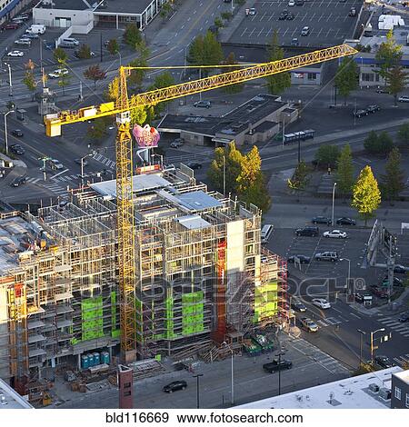 Yellow Tower Crane at a Construction Site View Large Photo Image Stock Photo - Yellow Tower Crane at a Construction Site. Fotosearch