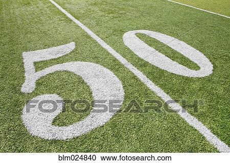 Stock Image - 50 Yard Line On Football Field. Fotosearch