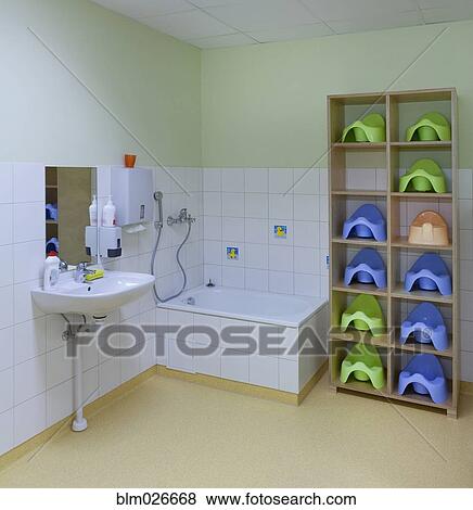 A bathroom, and shower, with hand basin and storage for pots View Large Photo Image Stock Photo - A bathroom, and shower, with hand basin and storage for pots. Fotosearch