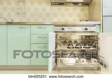 Stock Image - A contemporary style fitted kitchen. Fotosearch