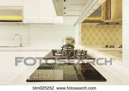 A contemporary style fitted kitchen View Large Photo Image Stock Image - A contemporary style fitted kitchen. Fotosearch