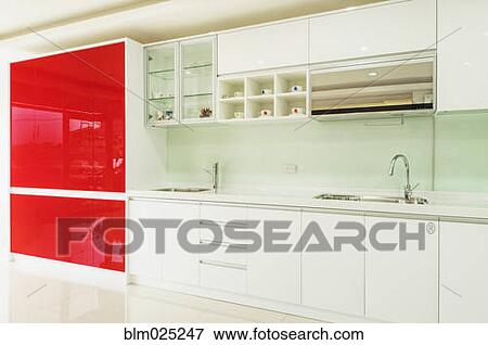 Stock Photo - A contemporary style fitted kitchen. Fotosearch
