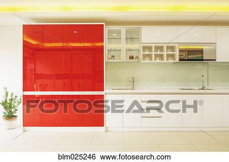 Stock Photograph - A contemporary style fitted kitchen. Fotosearch