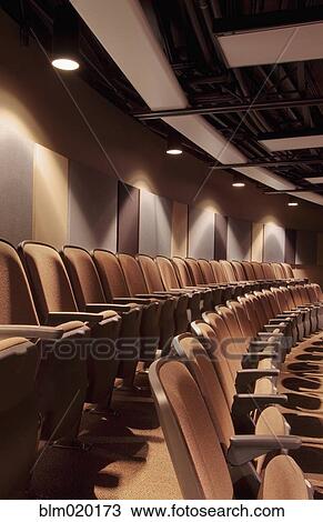 A detail of the audience seating at a live performance theater View Large Photo Image Stock Image - A detail of the audience seating at a live performance theater. Fotosearch