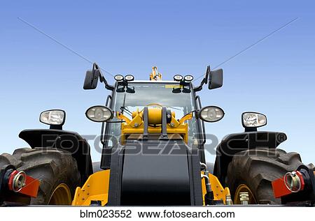 A frontal view of a spotless modern digger View Large Photo Image Stock Image - A frontal view of a spotless modern digger. Fotosearch