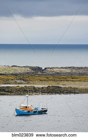 A harbor sea wall on the Isle of Skye View Large Photo Image Stock Photo - A harbor sea wall on the Isle of Skye. Fotosearch