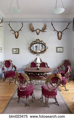 Stock Photography - A historic house with antique furniture and traditional landscaped gardens. Fotosearch