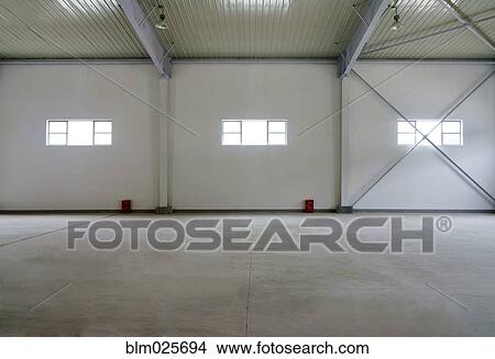 A large empty warehouse View Large Photo Image Picture - A large empty warehouse . Fotosearch