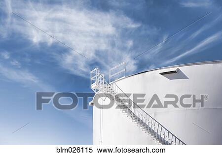 A large gas storage tank with a white exterior View Large Photo Image Stock Photography - A large gas storage tank with a white exterior. Fotosearch