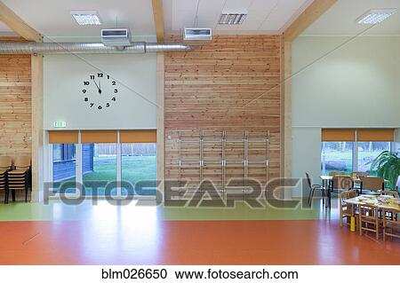 A large open hall, with a large clock on the wall View Large Photo Image Stock Image - A large open hall, with a large clock on the wall. Fotosearch