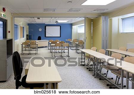 A large room with tables and chairs View Large Photo Image Stock Photo - A large room with tables and chairs. Fotosearch