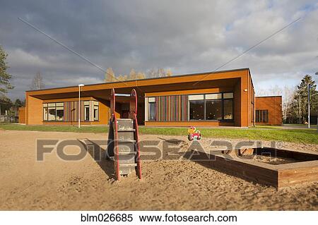 A large sand pit play area with a slide View Large Photo Image Stock Photography - A large sand pit play area with a slide. Fotosearch
