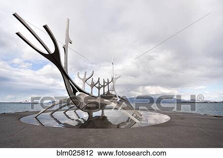Stock Image - A large Viking boat sculpture in the harbor at Reykjavik. Fotosearch