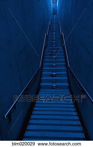 A long narrow flight of stairs View Large Photo Image Stock Photo - A long narrow flight of stairs. Fotosearch
