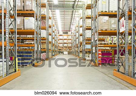 A paper distribution warehouse with stacked shelves View Large Photo Image Picture - A paper distribution warehouse with stacked shelves. Fotosearch