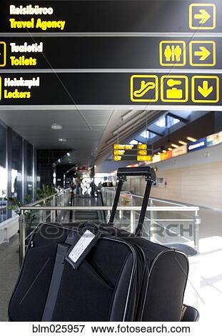 Stock Photo - A passenger information and direction sign Tallin airport. Fotosearch