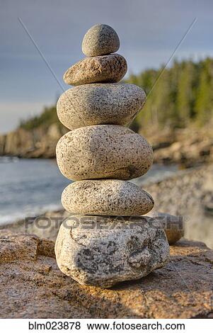 Stock Photo - A pile of smooth rounded stacked stones. Fotosearch