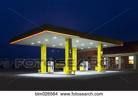Picture - A roadside garage at night. Fotosearch