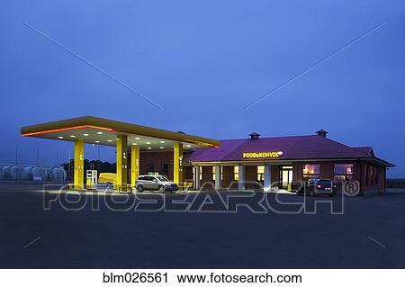 A roadside garage at night View Large Photo Image Stock Image - A roadside garage at night. Fotosearch