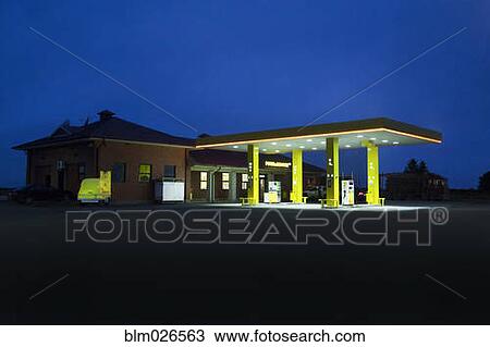 A roadside garage at night View Large Photo Image Stock Image - A roadside garage at night. Fotosearch