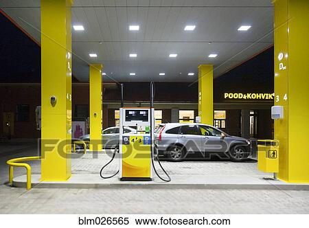 Stock Photography - A roadside garage at night. Fotosearch
