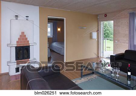 A sitting room in a suite, with sofas and table View Large Photo Image Stock Image - A sitting room in a suite, with sofas and table. Fotosearch