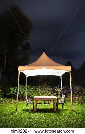 A small gazebo in a garden View Large Photo Image Stock Image - A small gazebo in a garden. Fotosearch