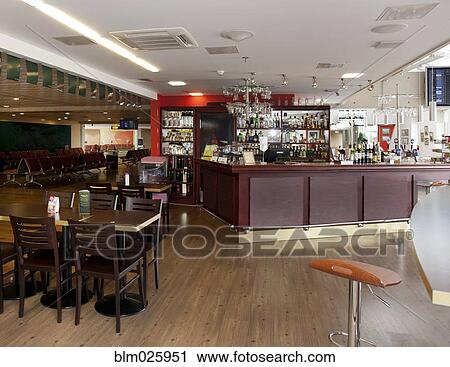 A well stocked bar with seats in the departure lounge View Large Photo Image Stock Image - A well stocked bar with seats in the departure lounge. Fotosearch