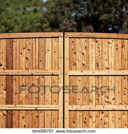 A wooden garden fence View Large Photo Image Stock Photo - A wooden garden fence. Fotosearch