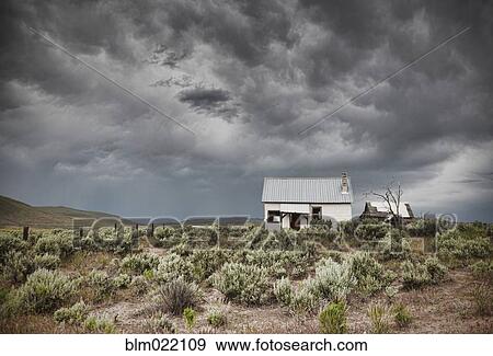 Abandoned Buildings Under a Dark Sky View Large Photo Image Stock Photo - Abandoned Buildings Under a Dark Sky. Fotosearch