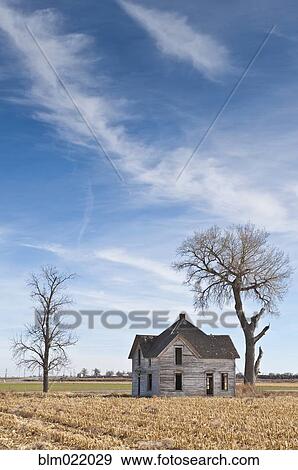Stock Photo - Abandoned House in Field. Fotosearch