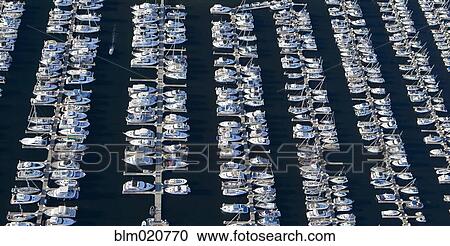 Stock Image - Aerial View of Yachts in a Marina. Fotosearch