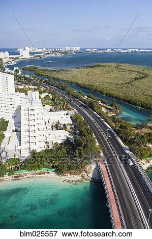 Stock Photo - Aerial view over the hotel zone at Cancun. Fotosearch