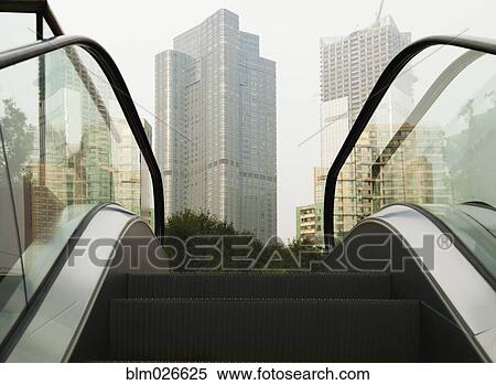Stock Photography - An escalator leading to a construction site . Fotosearch