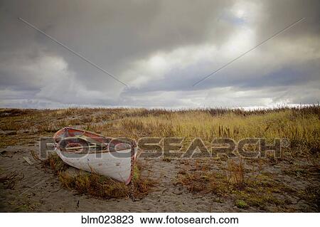 Stock Image - An old abandoned boat by the shore near Port Townsend. Fotosearch