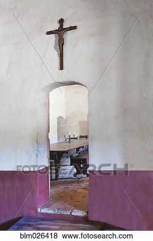 Arched doorway leading to dining room View Large Photo Image Stock Photo - Arched doorway leading to dining room. Fotosearch