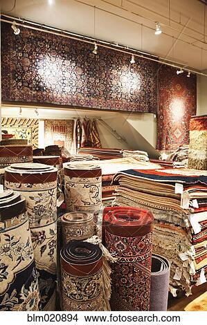 Picture - Area Rugs in a Store. Fotosearch