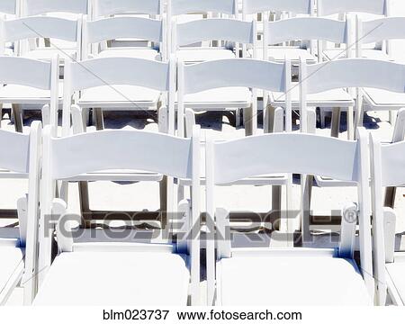Arrangement of Folding Chairs Outdoors View Large Photo Image Stock Photo - Arrangement of Folding Chairs Outdoors. Fotosearch