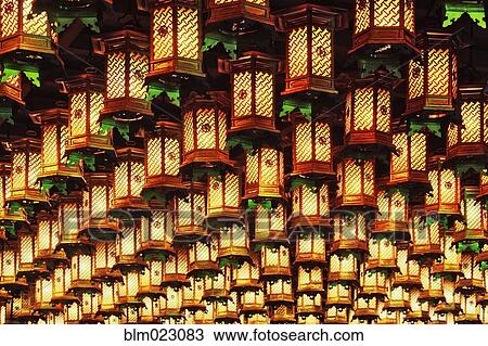 Stock Image - Asian Lanterns Suspended from a Ceiling. Fotosearch
