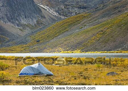 Stock Image - Backcountry camp at Grizzly Lake . Fotosearch