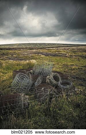 Stock Photography - Barbed Wire and Fence Rolls. Fotosearch