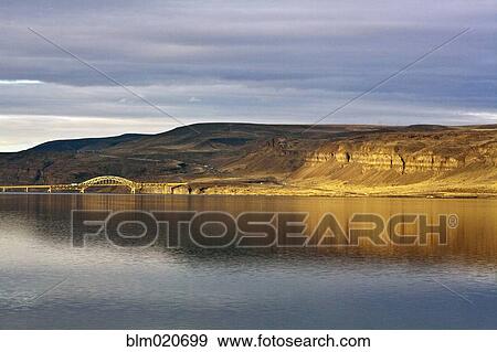 Barren Cliff Face Reflected in Water View Large Photo Image Stock Photo - Barren Cliff Face Reflected in Water. Fotosearch