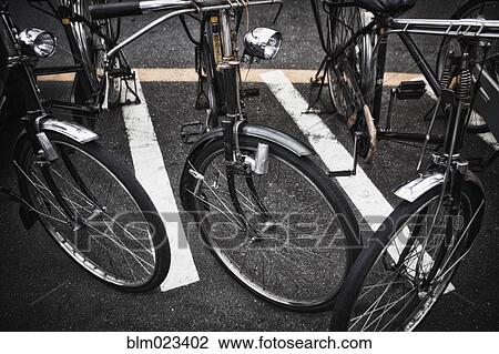 Stock Image - Bicycles in Downtown Tokyo, Japan. Fotosearch