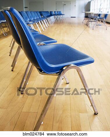 Picture - Blue Chair Seating in an Auditorium. Fotosearch