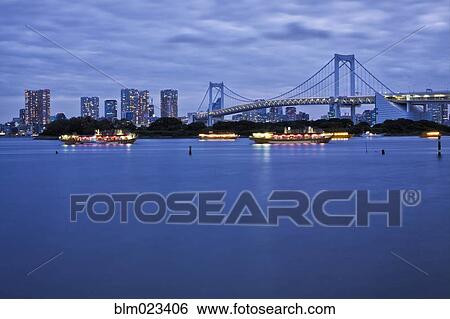Boats in Tokyo Bay with Rainbow Bridge and skyline, Obaida, Tokyo, Japan View Large Photo Image Stock Photograph - Boats in Tokyo Bay with Rainbow Bridge and skyline, Obaida, Tokyo, Japan. Fotosearch