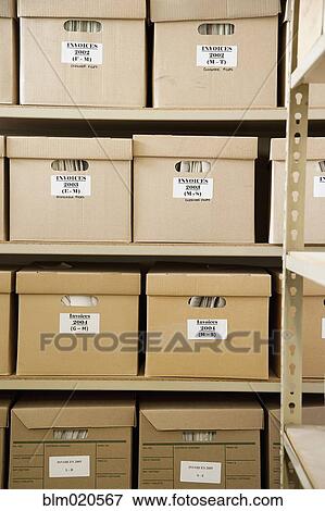 Stock Photo - Boxes of Invoices. Fotosearch