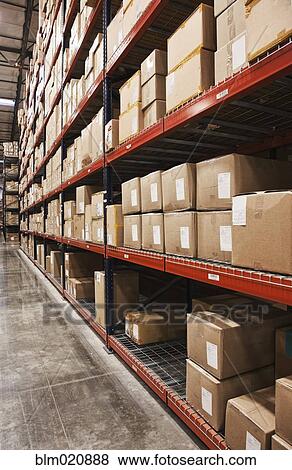 Boxes of Material Stacked on Shelves View Large Photo Image Stock Photo - Boxes of Material Stacked on Shelves. Fotosearch