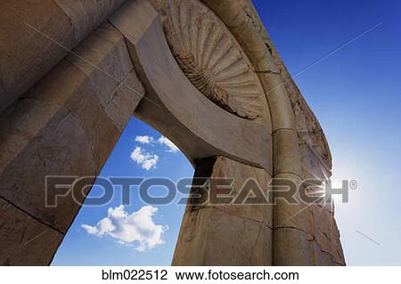 Stock Image - Buttress and Cloud with Sunburst. Fotosearch