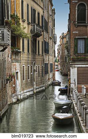 Stock Image - Canal through Old World City. Fotosearch
